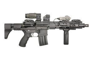 DSAT DR-15S with Shield red dot sight & magnifier, DBAL unit, side mounted light and Ergo front grip (closed stock)